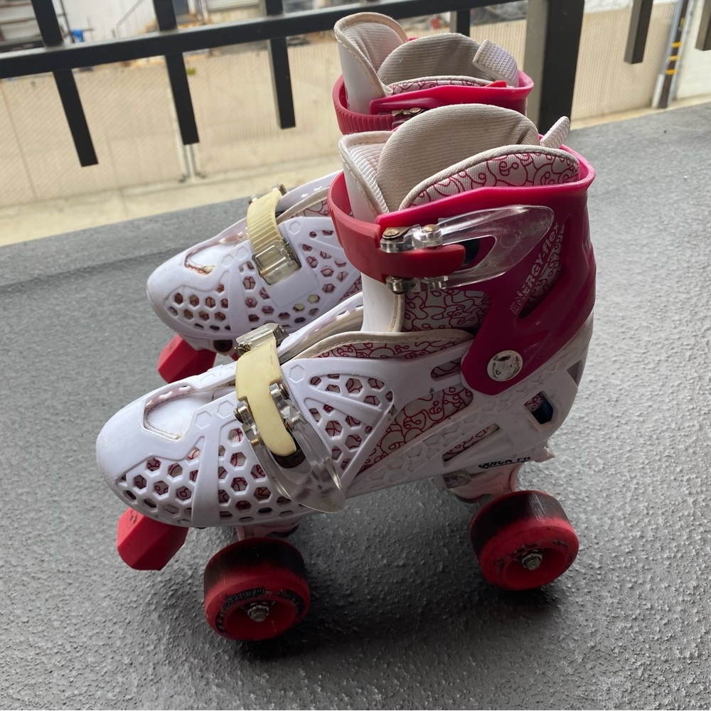 Roller Derby Kids Adjustable White and Pink Roller Skates w/ Padded Inserts